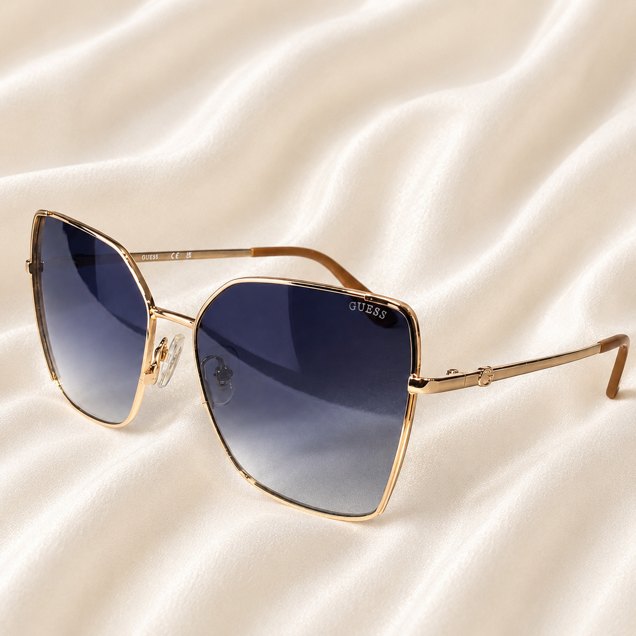 ÓCULOS DE SOL GUESS QUADRADO METALIZADO